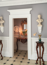 The brackets and statues enhance this hallway